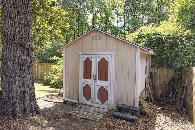 10129 Huntsman Path, Pensacola, FL 32514 - view of shed with a fenced backyard