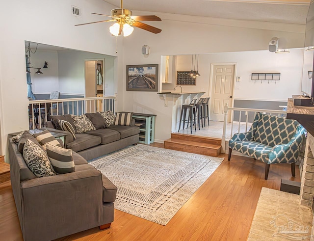 10129 Huntsman Path, Pensacola, FL 32514 - living room with visible vents, ceiling fan, lofted ceiling, and wood finished floors