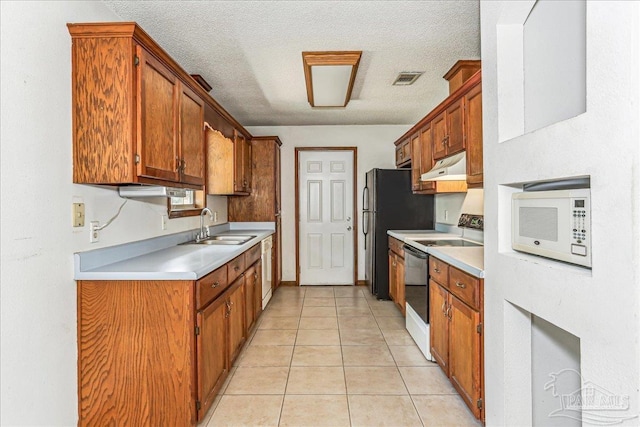 5471 Shamrock St, Milton, FL 32570 - kitchen featuring electric stove, a sink, under cabinet range hood, light countertops, and a textured ceiling
