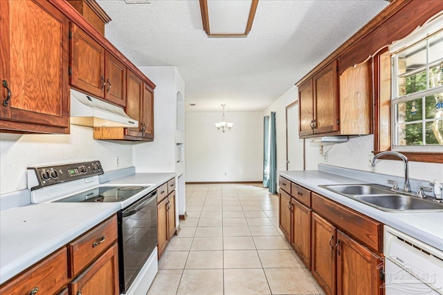 5471 Shamrock St, Milton, FL 32570 - kitchen featuring electric range oven, a sink, white dishwasher, under cabinet range hood, and light countertops