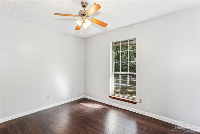 5471 Shamrock St, Milton, FL 32570 - empty room featuring hardwood / wood-style flooring, baseboards, and a ceiling fan