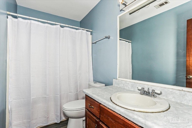 5471 Shamrock St, Milton, FL 32570 - bathroom featuring toilet and vanity