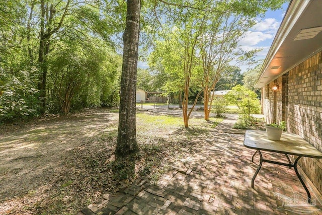 5471 Shamrock St, Milton, FL 32570 - view of yard with a patio area