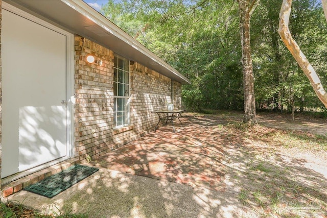 5471 Shamrock St, Milton, FL 32570 - view of home's exterior with a patio