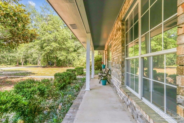 5471 Shamrock St, Milton, FL 32570 - view of patio / terrace with a porch