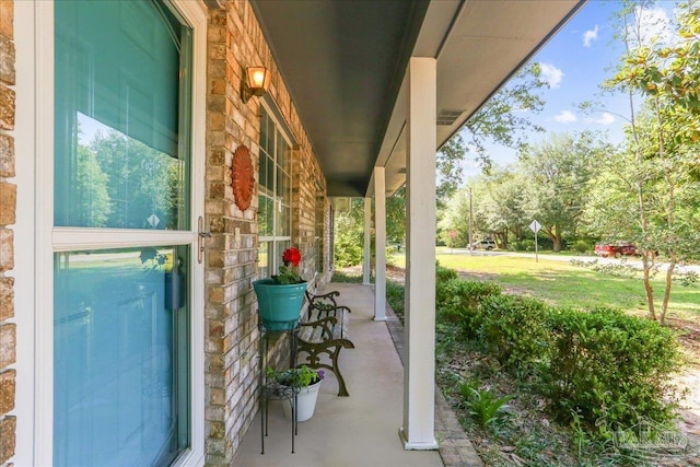 5471 Shamrock St, Milton, FL 32570 - view of patio / terrace with a porch