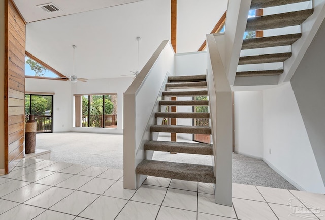 1567 Whisper Bay Blvd, Gulf Breeze, FL 32563 - stairway featuring carpet, high vaulted ceiling, and ceiling fan