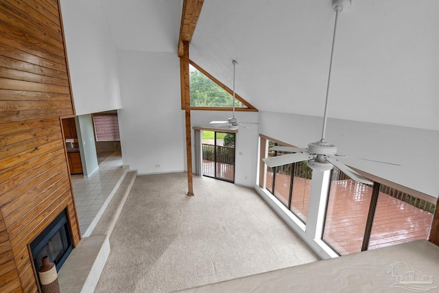 1567 Whisper Bay Blvd, Gulf Breeze, FL 32563 - unfurnished living room featuring a ceiling fan, high vaulted ceiling, carpet, a fireplace, and beamed ceiling
