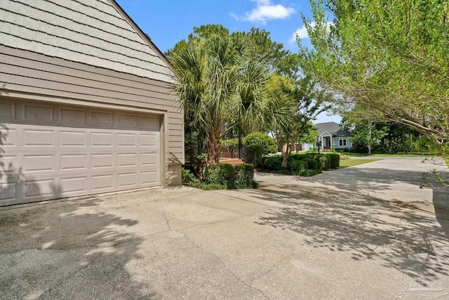 1567 Whisper Bay Blvd, Gulf Breeze, FL 32563 - garage featuring driveway