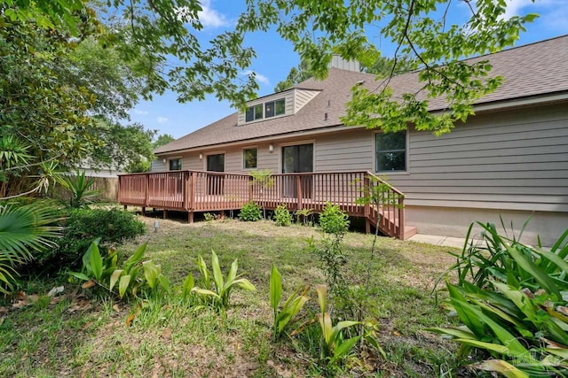 1567 Whisper Bay Blvd, Gulf Breeze, FL 32563 - back of house featuring a wooden deck and roof with shingles