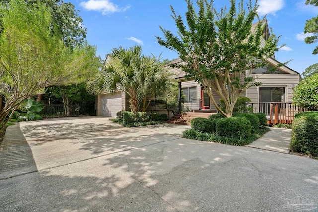 1567 Whisper Bay Blvd, Gulf Breeze, FL 32563 - obstructed view of property with a garage