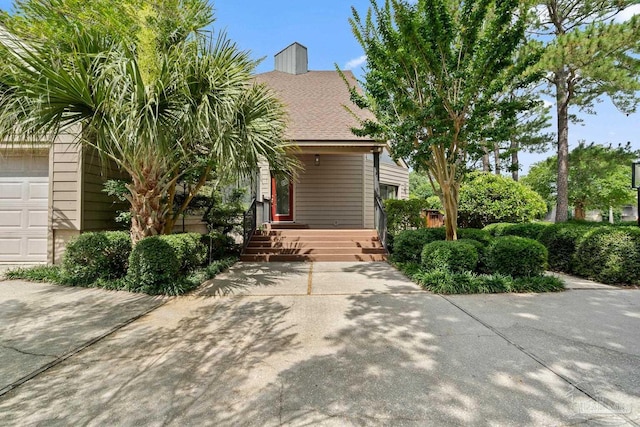 1567 Whisper Bay Blvd, Gulf Breeze, FL 32563 - obstructed view of property with a garage