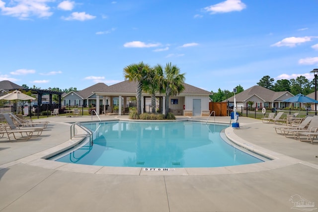 3921 Amble Way, Pace, FL 32571 - community pool featuring fence, a patio, and a residential view