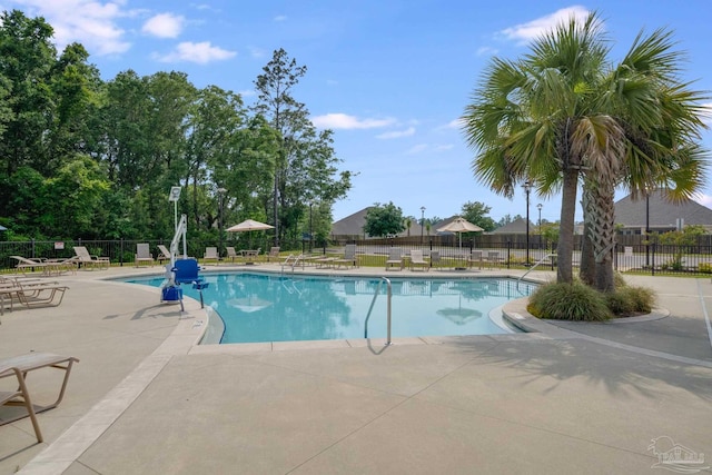 3921 Amble Way, Pace, FL 32571 - community pool with fence and a patio