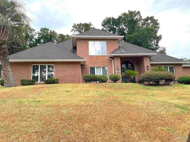 view of front of property with a front lawn