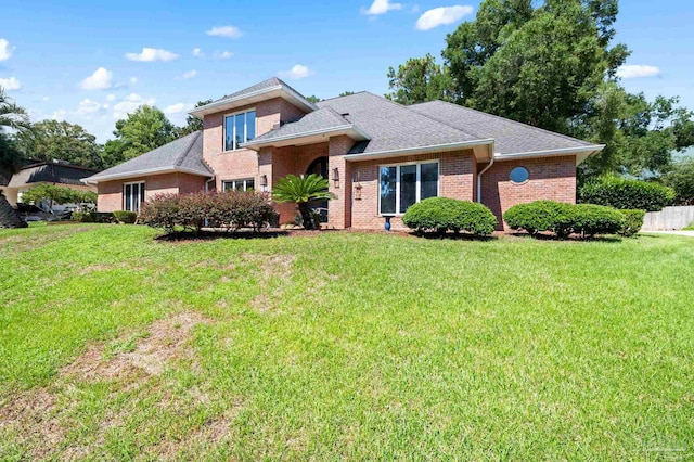 view of front of house with a front lawn