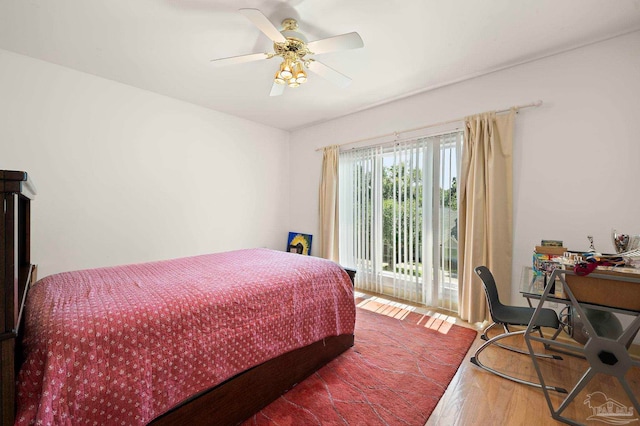 bedroom with ceiling fan, hardwood / wood-style flooring, and access to outside