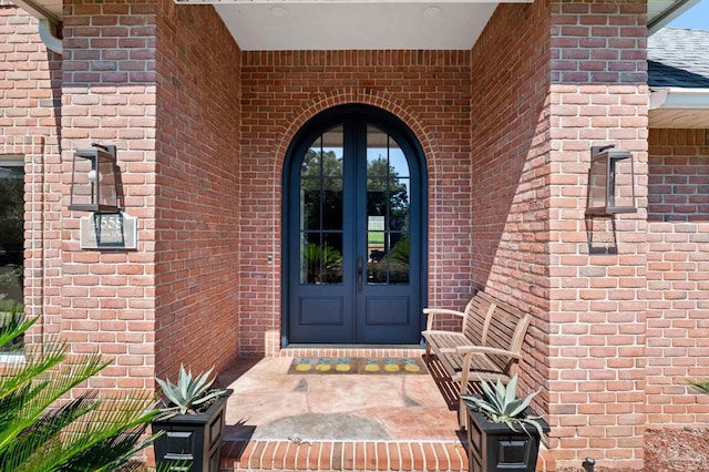 entrance to property featuring french doors