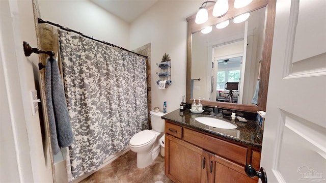 bathroom with tile patterned flooring, vanity, and toilet