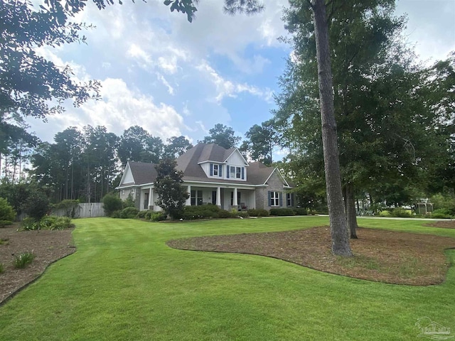 view of front of property with a front lawn