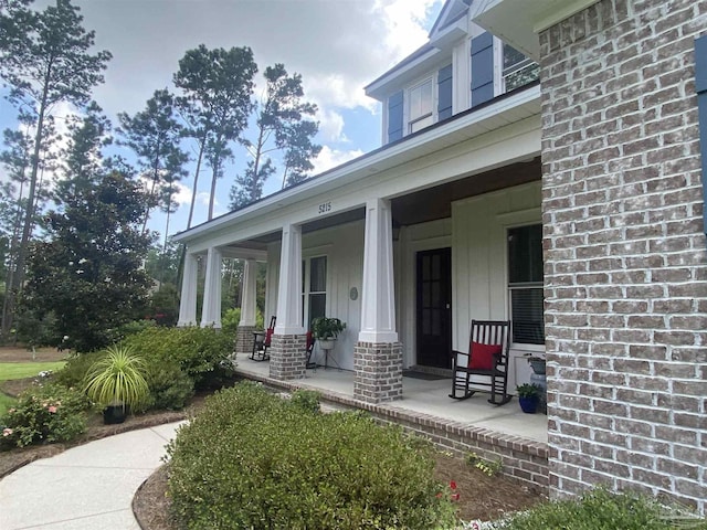 entrance to property with covered porch