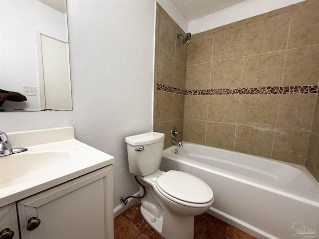 full bathroom featuring toilet, a textured ceiling, baseboards, bathtub / shower combination, and vanity