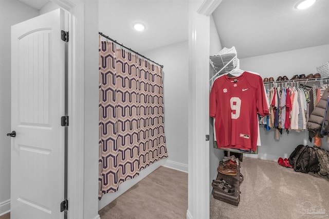 spacious closet featuring light hardwood / wood-style floors