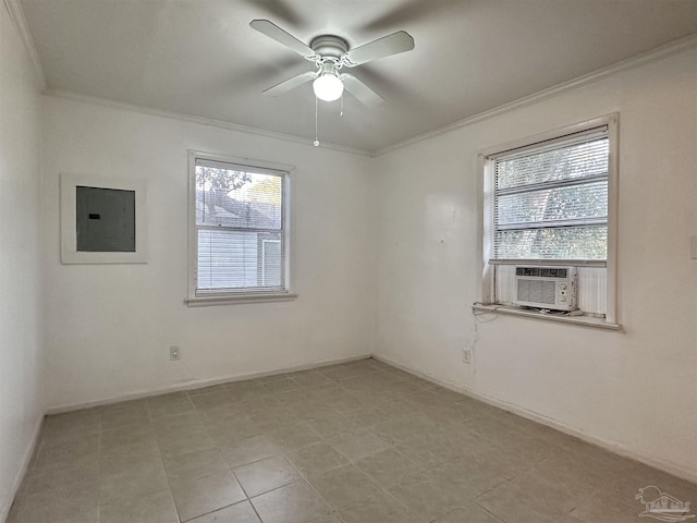 unfurnished room featuring plenty of natural light, electric panel, ornamental molding, and ceiling fan