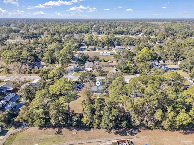 aerial view with a wooded view