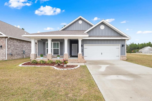 craftsman inspired home featuring a porch, an attached garage, driveway, board and batten siding, and a front yard