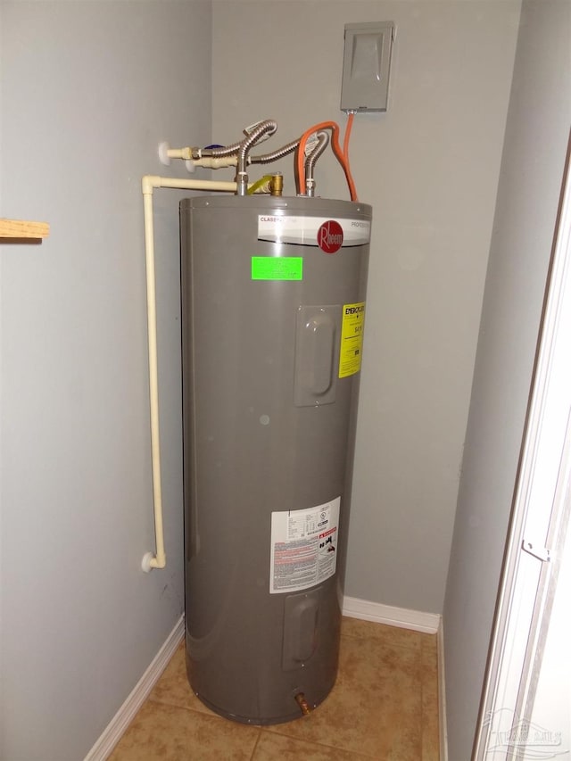 utility room featuring water heater