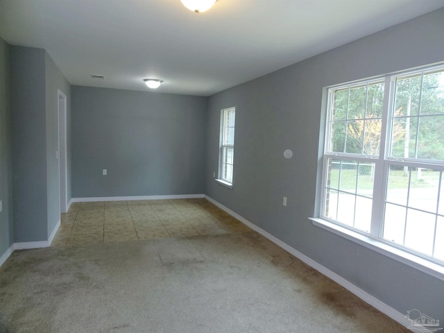 view of carpeted spare room