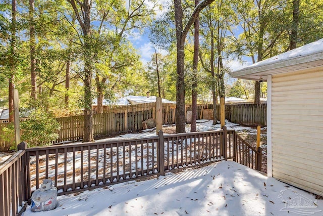 view of snow covered deck