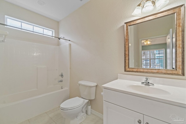 full bathroom featuring toilet, vanity, tile patterned floors, and shower / bathing tub combination