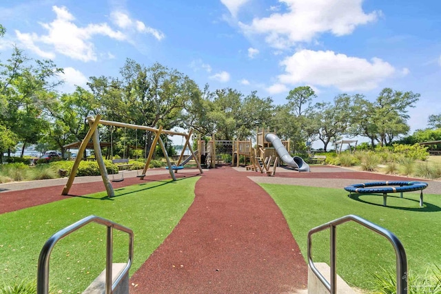 view of jungle gym with a lawn