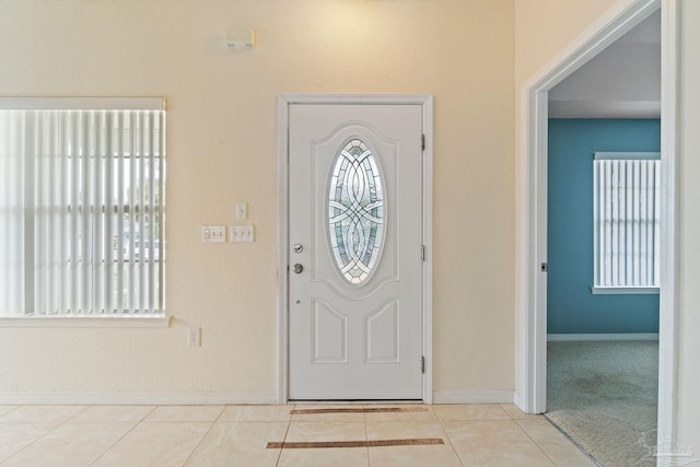 view of tiled foyer entrance