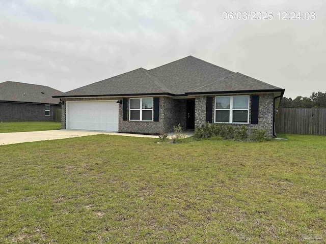 8659 Tarsus Dr, Milton, FL 32583 - view of front facade featuring an attached garage, driveway, and a shingled roof