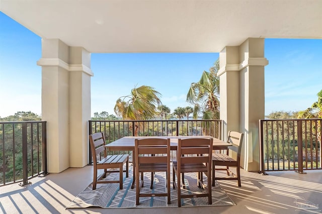 balcony featuring outdoor dining space