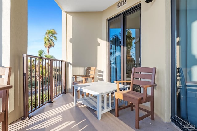 balcony featuring visible vents