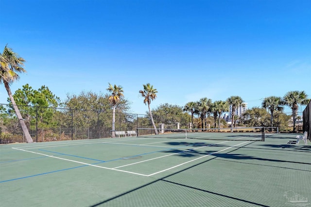 view of sport court with fence