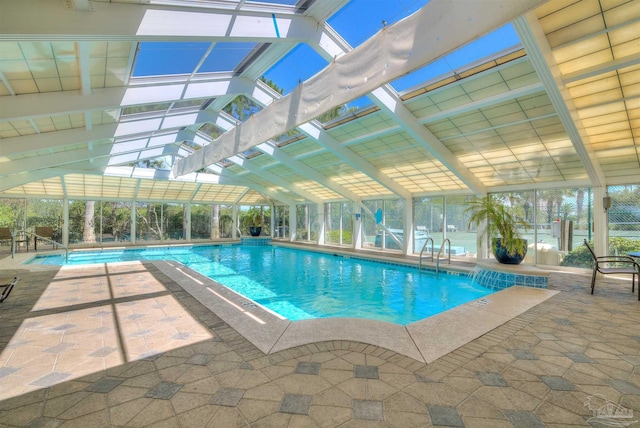 community pool featuring a patio and a lanai