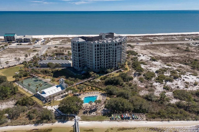 bird's eye view with a beach view and a water view