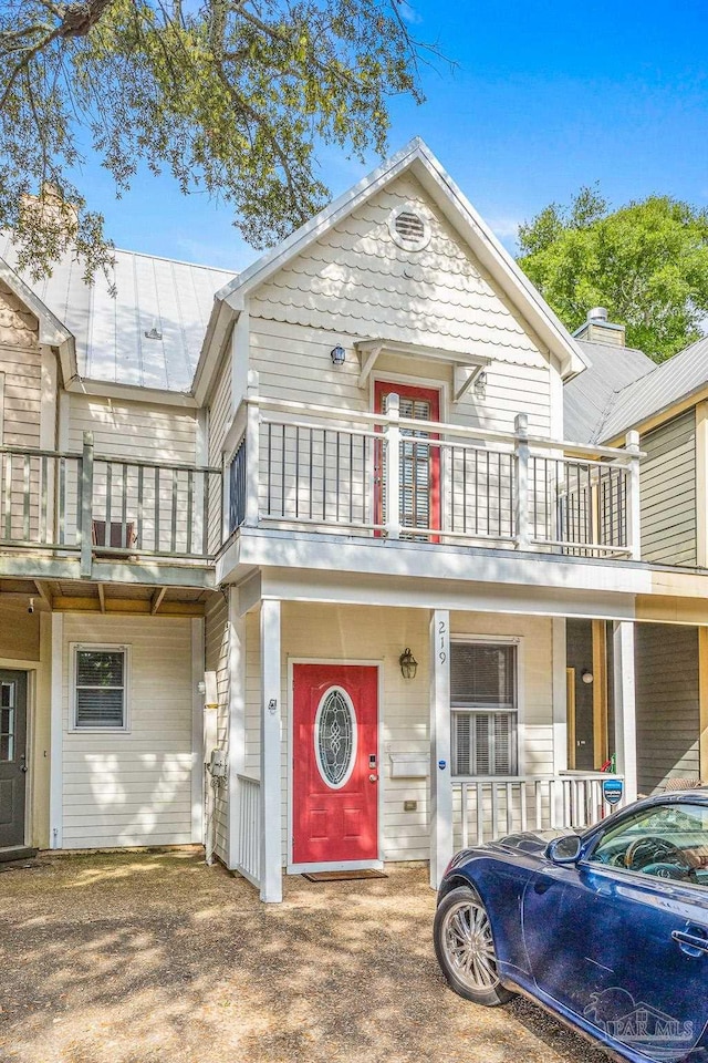 view of property with a balcony