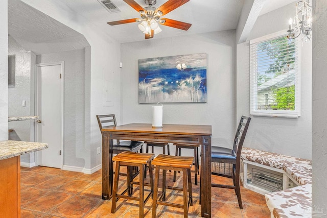 dining room featuring tile patterned floors and ceiling fan