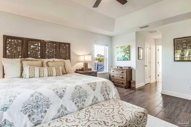 bedroom featuring dark wood-type flooring and ceiling fan