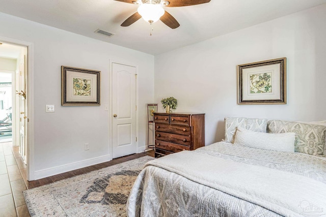 bedroom featuring ceiling fan and light wood-type flooring