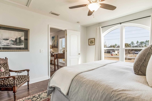 bedroom featuring ceiling fan and dark hardwood / wood-style floors