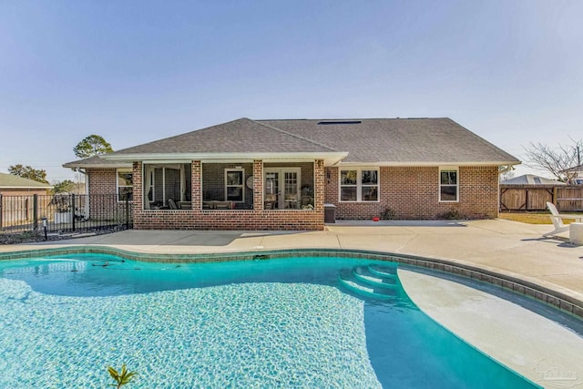 view of pool featuring a patio