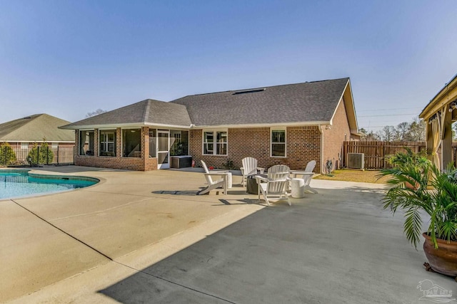 view of swimming pool featuring central AC and a patio area