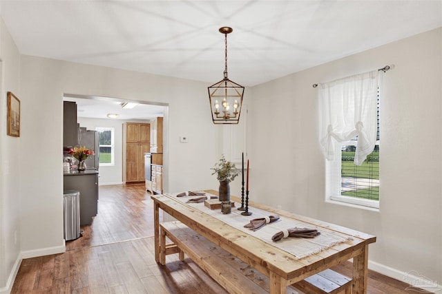 dining area with wood-type flooring